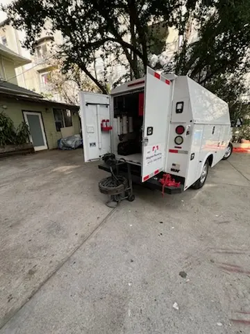 Magnet Plumbing service vehicle on-site for Grease Trap Cleaning in Pembroke Pointe